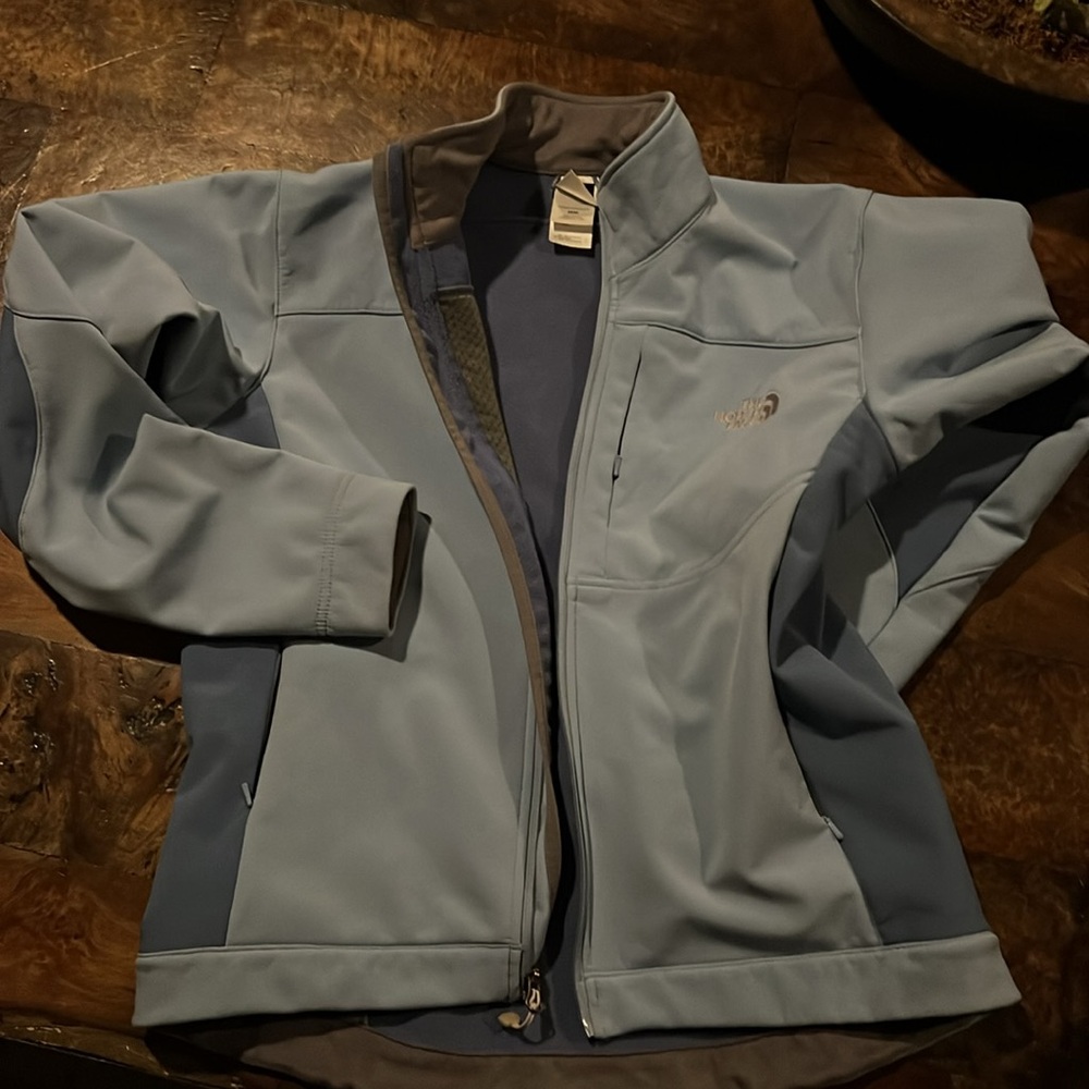 The North Face Women's Light Blue Apex Jacket.